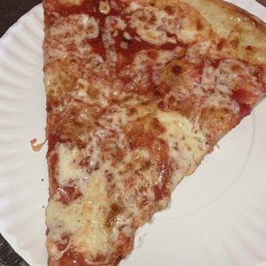 Photo of 2 Bros Pizza - New York, NY, United States. $1 pizza