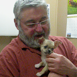 City Park Animal Clinic - Our wonderful doctor, introducing himself to a new puppy for the first time.