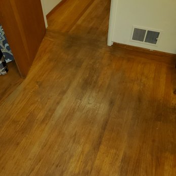 Mugi's Hardwood Floors - Before - high traffic areas were black - Flooring Near Me