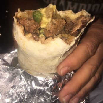 Uno Dos Tacos - Husband's burrito. HUGE! - Tacos Near Me - Denham Springs, Louisiana Uno Dos Tacos - Husband's burrito. HUGE! - Tacos Near Me - Denham Springs, Louisiana
