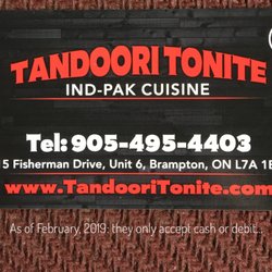 Tandoori Tonite - The signage outside the restaurant is outdated. Cash & debit only, eh.