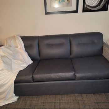 Sonesta ES Suites Raleigh Cary - World's most uncomfortable sofa and nasty feeling vinyl - Hotels Near Me - Cary, North Carolina