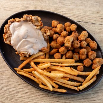 The Lookout Kitchen-Robbers Cave - a plate of fried chicken and fries - American Near Me - Wilburton, Oklahoma The Lookout Kitchen-Robbers Cave - a plate of fried chicken and fries - American Near Me - Wilburton, Oklahoma