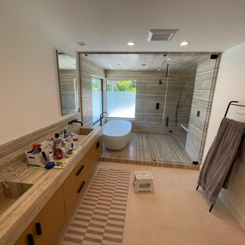 Santiago's Construction - a large bathroom with a walk in shower - General Contractors Near Me Santiago's Construction - a large bathroom with a walk in shower - General Contractors Near Me
