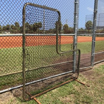 Bert Winters Park - Great looking baseball field with dugouts, fenced in outfield and pitchers cage for batting practice - Parks Near Me - Juno Beach, Florida