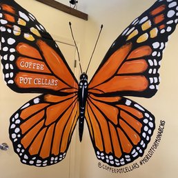 a butterfly painted on the wall
