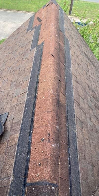 Slide of RainTight Roofing