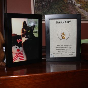 Eternity Pet Memorial - On the left, his ashes in framed photo, right pawprint and lock of hair on back of photo. - Pet Cremation Services Near Me - Pittsburgh, Pennsylvania Eternity Pet Memorial - On the left, his ashes in framed photo, right pawprint and lock of hair on back of photo. - Pet Cremation Services Near Me - Pittsburgh, Pennsylvania