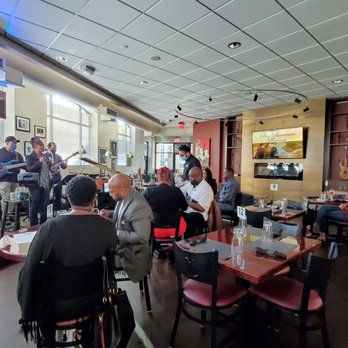 Sam's Place - Friday evening with Donna Woodall on stage at Sam's Place. - Cafes Near Me - Milwaukee, Wisconsin
