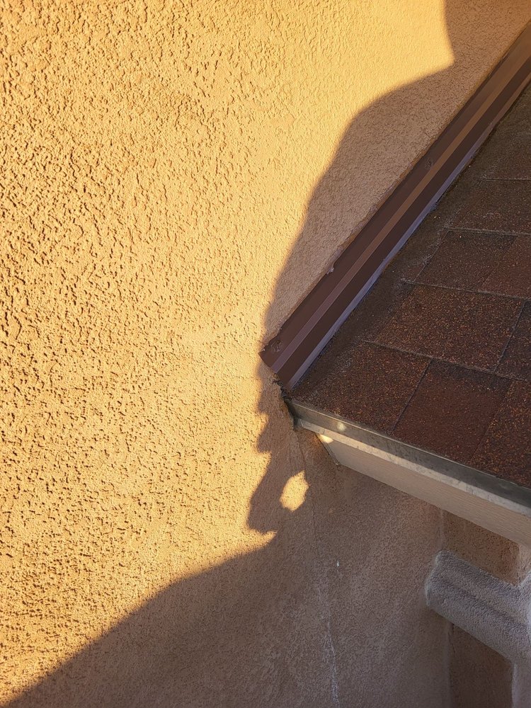 Slide of Mann & Sons Roofing