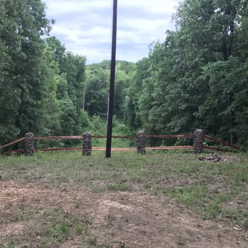 Harris Property Services - Custom built natural stone and cedar fence - Tree Services Near Me - California, Missouri Harris Property Services - Custom built natural stone and cedar fence - Tree Services Near Me - California, Missouri
