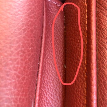 Allied Auto Glass - Broken glasses in the leather seat gap - Windshield Installation & Repair Near Me