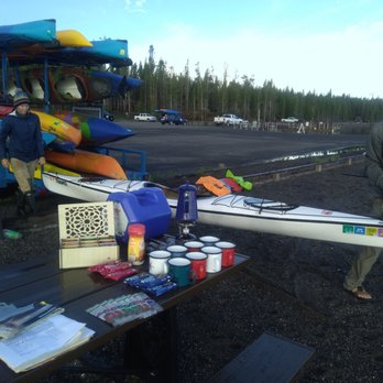 Prismatic Tours - Maddie and Alan set out our kayaks after setting up the morning spread. - Rafting/Kayaking Near Me Prismatic Tours - Maddie and Alan set out our kayaks after setting up the morning spread. - Rafting/Kayaking Near Me