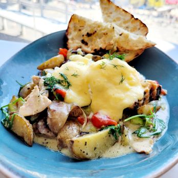 Milestones - a plate of food on a table - Comfort Food Near Me - Toronto, Ontario