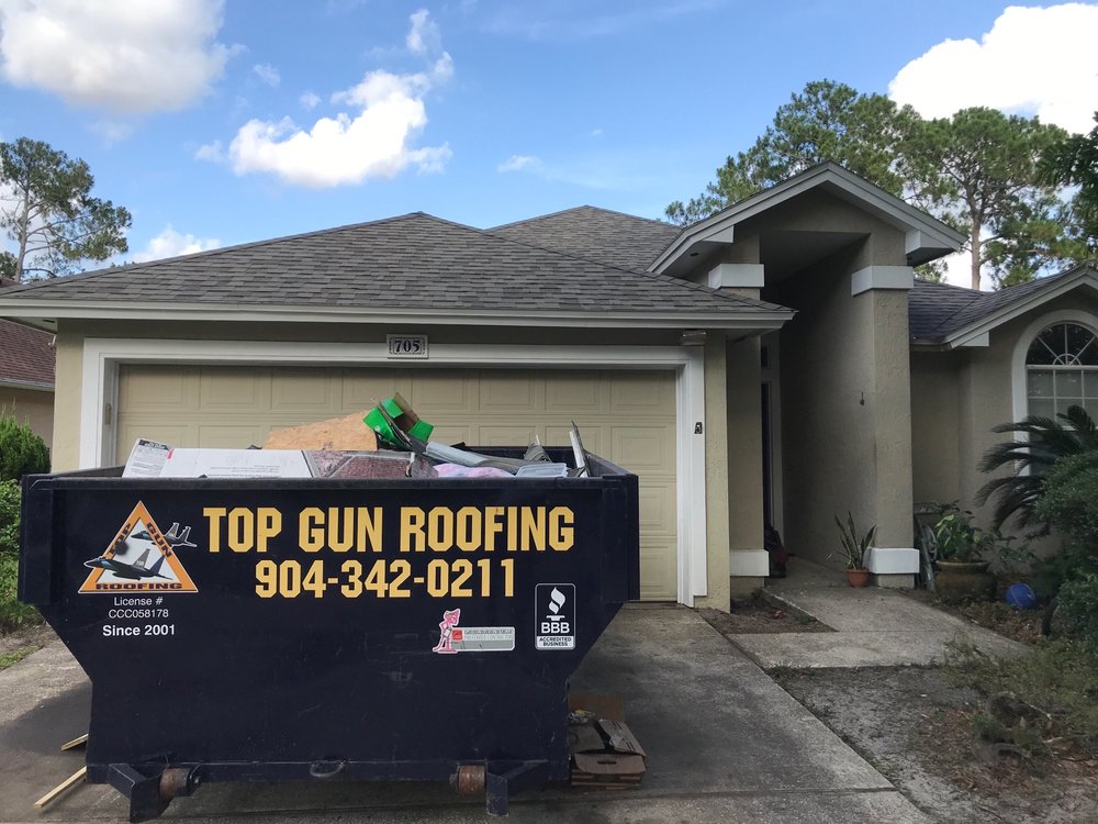 Slide of Top Gun Roofing