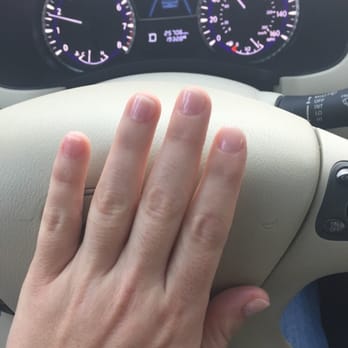 Taylor Nail Spa - She got got red streaks mixed in with my nude color from a badly painted clear. She did not fix it. - Nail Salons Near Me - Huntsville, Texas