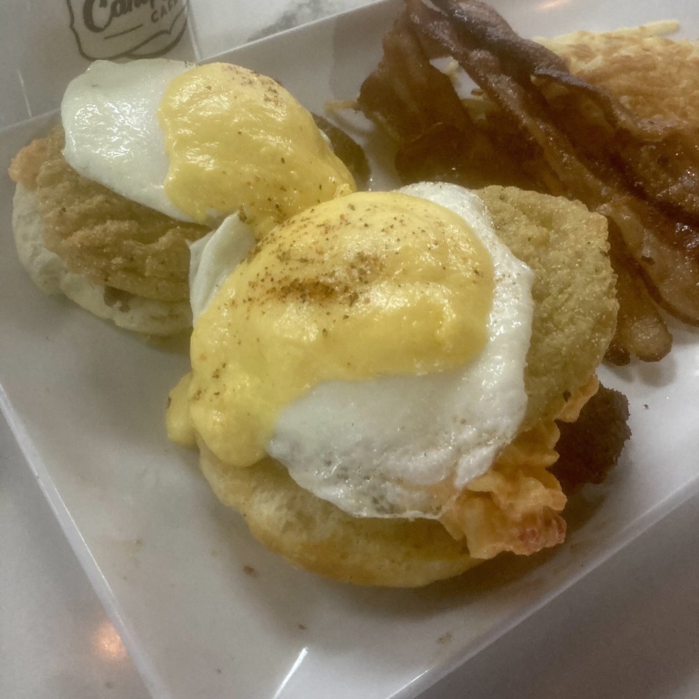 Southern Benedict with bacon and hash browns.