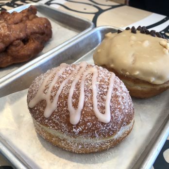 Donut Monster - Paloma grapefruit donut, peanut butter banana donut and apple fritter in the background - Donuts Near Me - Hamilton, Ontario