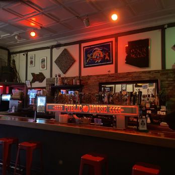 Prescott Public House - a bar with red stools - Pubs Near Me - Prescott, Arizona