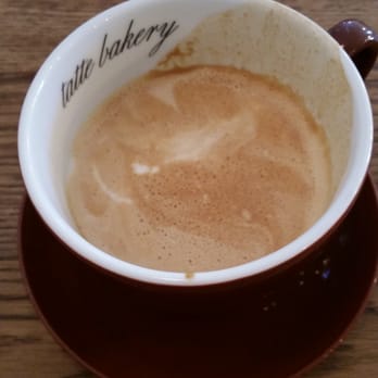Tatte Bakery & Cafe - Small latte served in a large cup in the sloppiest way possible! This is how I received the coffee,before attempting to drink it - Cafes Near Me - Boston, Massachusetts Tatte Bakery & Cafe - Small latte served in a large cup in the sloppiest way possible! This is how I received the coffee,before attempting to drink it - Cafes Near Me - Boston, Massachusetts
