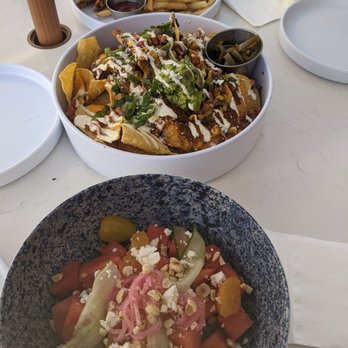 Sandbar - Chicken Tenders, Nachos, Watermelon & Strawberry salad - Bars Near Me - Las Vegas, Nevada