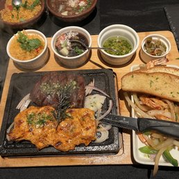 Chicken, steak, and shrimp. Chimichurri oil dip was especially good on the shrimp