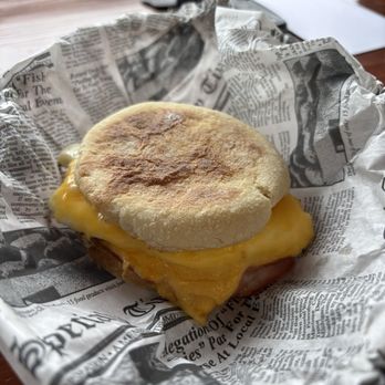 Caffe Cocina - A classic! Egg, cheddar and sausage breakfast sandwich - Coffee & Tea Near Me - Poulsbo, Washington
