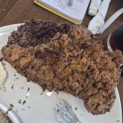 Logan's Biscuit - Burnt barely battered chicken fried steak