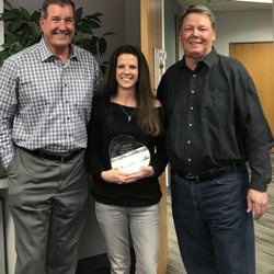 Agape Healthcare - Owners Kim and Larry present 10-year service award