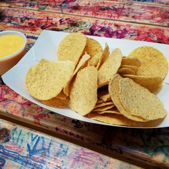 Mucho Mahalo Burritos - Basic nachos which are chips and nacho cheese. It is good at least. - Mexican Near Me - Melbourne, Florida Mucho Mahalo Burritos - Basic nachos which are chips and nacho cheese. It is good at least. - Mexican Near Me - Melbourne, Florida