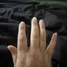 One gel nail left after one week. And my toes are hashed too. $100 for one week of nails. Not cool