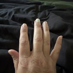 David's Happy Nails - One gel nail left after one week. And my toes are hashed too. $100 for one week of nails. Not cool