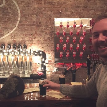 Draught Industries - Eli enjoying the Toccalmatto B Space Invader Black IPA. It's BOSS. - Beer Bar Near Me - Beacon, New York Draught Industries - Eli enjoying the Toccalmatto B Space Invader Black IPA. It's BOSS. - Beer Bar Near Me - Beacon, New York