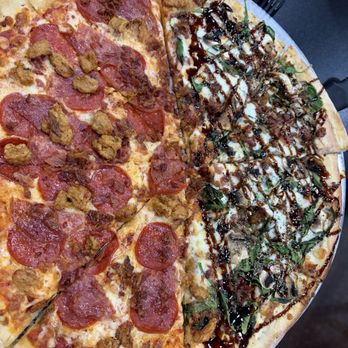 Bergheim Pizza Company - Pizza - half Bianca and half Turf & Turf (meat lovers) - Pizza Near Me - Boerne, Texas Bergheim Pizza Company - Pizza - half Bianca and half Turf & Turf (meat lovers) - Pizza Near Me - Boerne, Texas