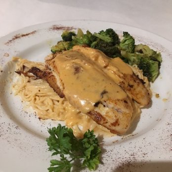 Bailey's Seafood & Grill - Grilled tilapia with side of seasoned vegetables (broccoli). Under $20 and yummy. - American Near Me - Lafayette, Louisiana