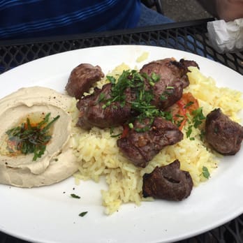 Garlic Crush - Grilled lamb with hummus on the side. - Mediterranean Near Me - Bellevue, Washington Garlic Crush - Grilled lamb with hummus on the side. - Mediterranean Near Me - Bellevue, Washington