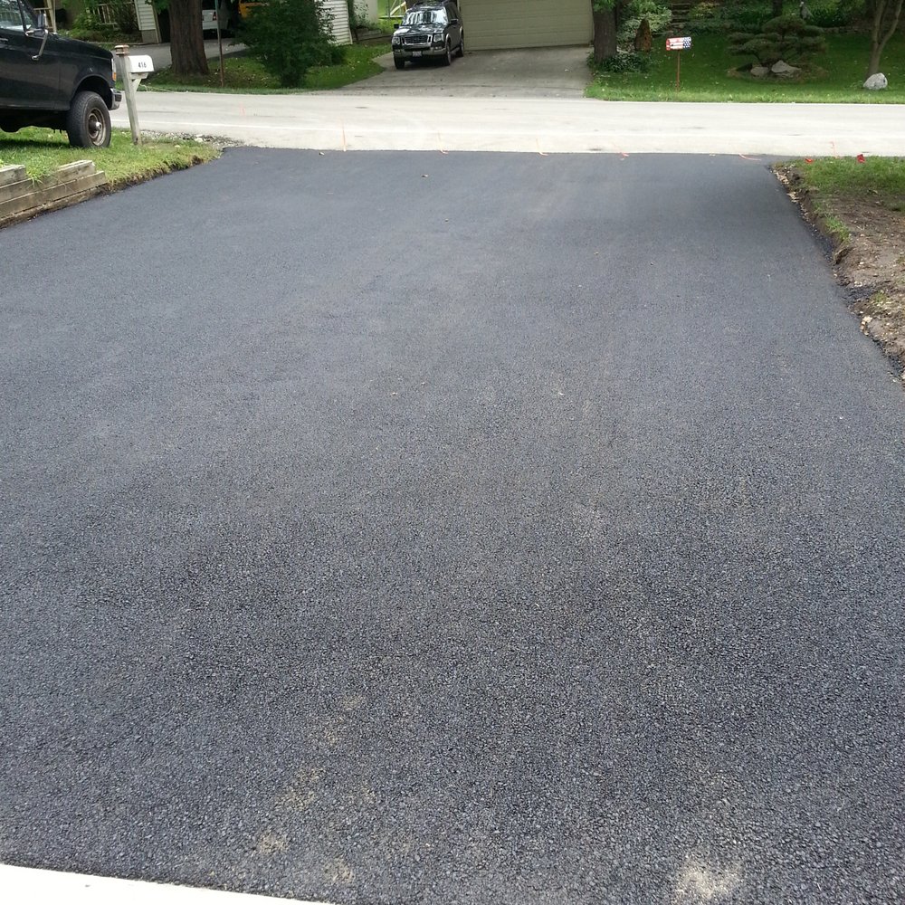 Sandman Paving and Seal Coating - Drive way - Masonry/Concrete Near Me - Gilberts, Illinois Sandman Paving and Seal Coating - Drive way - Masonry/Concrete Near Me - Gilberts, Illinois