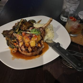 Latitude 34 - Had the pork chop was amazing the Brussel sprouts were (don't tell my momma) better than mamma made. - New American Near Me - Camarillo, California Latitude 34 - Had the pork chop was amazing the Brussel sprouts were (don't tell my momma) better than mamma made. - New American Near Me - Camarillo, California
