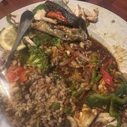Their Sherpa rice... absolutely swimming in this teriyaki sauce. Not edible. The trout that was on top was very good.