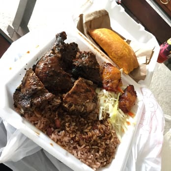 Mama's Paradise Restaurant - Large jerk chicken plate and a chicken patty - Caribbean Near Me - Duluth, Georgia Mama's Paradise Restaurant - Large jerk chicken plate and a chicken patty - Caribbean Near Me - Duluth, Georgia
