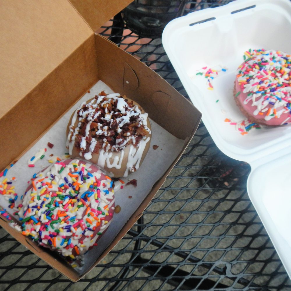Glazed Over Donuts - Strawberry glaze with sprinkles and vanilla drizzle. Maple glaze with bacon and marshmallow drizzle. - Donuts Near Me - Beacon, New York Glazed Over Donuts - Strawberry glaze with sprinkles and vanilla drizzle. Maple glaze with bacon and marshmallow drizzle. - Donuts Near Me - Beacon, New York