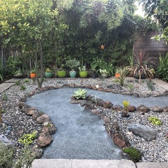 Allegrow Landscaping - Casey and his team incorporated some of the existing plants into his design and added a fig tree - Landscape Architects or Designers Near Me