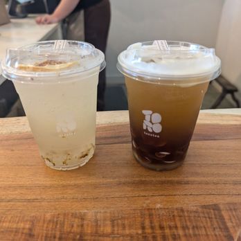 Torotea - Left: Osmanthus Oolong Citrus Refresher with Osmanthus Jelly Right: Roasted Barley Iced Tea with Black Tea Tapioca Mochi - Coffee & Tea Near Me - Diamond Bar, California