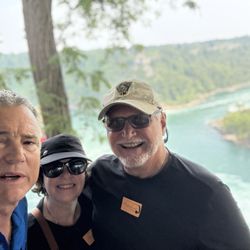 Magnificent Tours - John not only took our picture but he was part of it- blue shirt. What a delight.