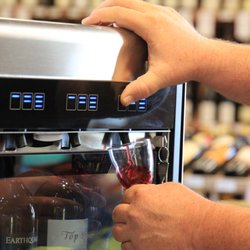 Sodie's Wine and Spirits - Tasting area features four red and four white wines to test.