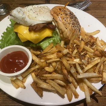 Local Goat - Farmhouse burger with the egg over easy, and fresh cut fries. Rolls are baked on site daily and super fresh. - New American Near Me - Pigeon Forge, Tennessee