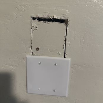 Precision Electric Service - How they originally patched up their hole. - Electricians Near Me - Sacramento, California Precision Electric Service - How they originally patched up their hole. - Electricians Near Me - Sacramento, California