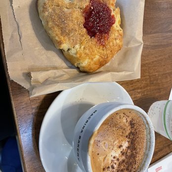 Macrina Bakery & Cafe - Buttermilk jam biscuit, 12 oz latte (self added cinnamon sprinkle) - Bakeries Near Me - Seattle, Washington