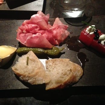 Social - Some bread, cheese, thinly sliced prosciutto, and these little amazing watermelon infused cubes!!! All super tasty!! - Tapas/Small Plates Near Me - Fort Collins, Colorado
