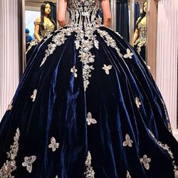Latin Bridal - Quinceanera trying on the gown of her dreams.